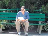  ?? WAYNE PARRY/ASSOCIATED PRESS ?? Pete Martorana studies a betting sheet outside Monmouth Park racetrack in Oceanport, N.J., Thursday. Monmouth Park took in nearly $2.3 million in sports betting revenue in the first two weeks it was legal in New Jersey.