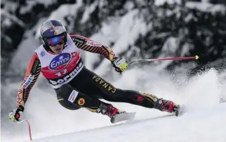  ?? Olivier Morin/AFP/Getty Images ?? Canada’s Erik Guay, in Bormio, Italy, Sunday, broke a record held by “Crazy Canuck” Steve Podborski.