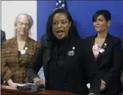  ?? BOB BROWN — RICHMOND TIMES-DISPATCH VIA AP ?? Delegate Jennifer Carroll Foy, D-Prince William, center, speaks during a news conference of Equal Rights Amendment supporters inside the Pocahontas Building in Richmond, Va., on Jan. 22, 2019. An unusually broad field is vying to be the next governor of Virginia.