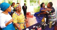  ?? ?? United by their two mothers . . . First Ladies Dr Auxillia Mnangagwa and Mrs Neo Jane Masisi had to admire as Ms Phatsimo Matshediso and Ms Ivy Musariri hugged each other, having been trading virtually in skin care products, only to see each other at Zimbabwe House on Thursday.