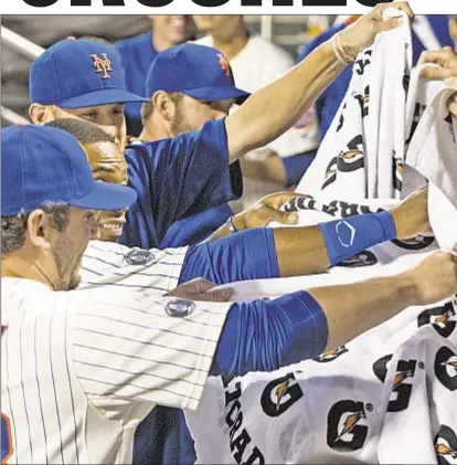  ?? HOWARD SIMMONS/DAILY NEWS ?? Before Tuesday, Chris Young might’ve wanted to hide in this sea of towels, but dugout celebratio­n is in honor of maligned outfielder, who hits second HR of night (r.) in rout of A’s.