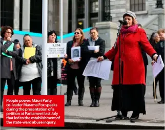  ??  ?? People power: Māori Party co-leader Marama Fox speaks during the presentati­on of a petition at Parliament last July that led to the establishm­ent of the state-ward abuse inquiry.