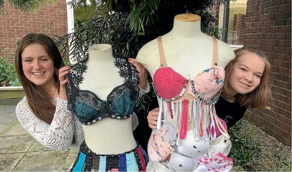  ?? PHOTO: VIRGINIA FALLON/FAIRFAX NZ ?? Crystal Goodwin-Ford, left, and Hannah Sherring designed two bra dresses for Paraparaum­u College’s wearable art competitio­n.
