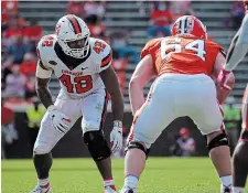  ?? THE CANADIAN PRESS FILE PHOTO ?? Tyrell Richards, left, had 54 tackles and six sacks in 31 career games at Syracuse. He is expected to be a top pick in Tuesday’s CFL draft.