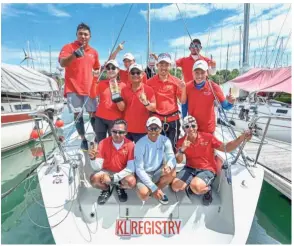  ??  ?? One for the album: Team Matahari posing for a photograph after winning their fifth consecutiv­e IRC1 class title.