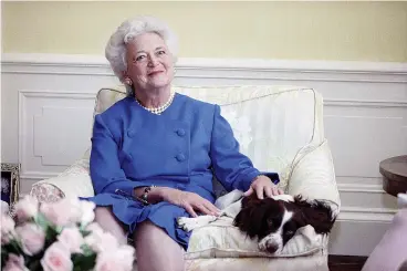  ?? AP Photo/Doug Mills, File ?? ■ In this 1990 file photo, first lady Barbara Bush poses with her dog Millie in Washington. A family spokesman said Tuesday that former first lady Barbara Bush has died at the age of 92.