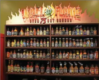  ?? PETE BANNAN – DIGITAL FIRST MEDIA ?? Ready for the hot stuff? California Tortilla has over 75 distinct hot sauce selections at the new fastcasual Mexican-inspired restaurant in Exton. The sauces range from mild to tongue-melting, allowing guests to customize the spiciness of their meal.