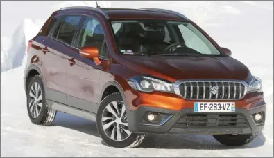  ??  ?? Une calandre plus massive permet au S-Cross d’afficher plus de personnali­té. Suzuki S-Cross 1.4 Boosterjet AllGrip Style 27 390 € 140 ch CO2 : 141 g/km