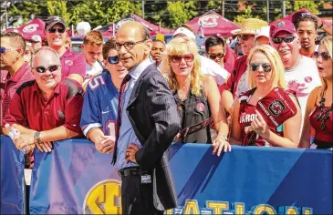  ?? TIM DOMINICK / THE STATE / MCT ?? “It’s just the (COVID-19) spikes around the country are happening at probably the worst possible time to safely execute college football,” says ESPN’s Paul Finebaum.