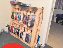  ?? ?? Is it a wood pallet? No! It’s a bookshelf.