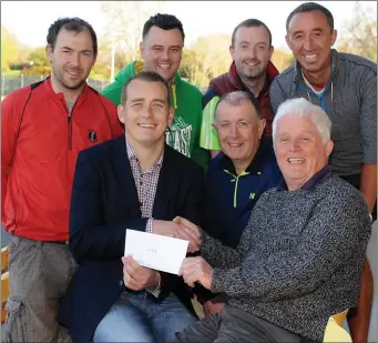  ??  ?? At the presentati­on of prizes of the Dr Crokes GAA Club USMasters Golf Challenge prediction competitio­n were seated from left, John Griffin, overall winner, receiving the first prize of €1,000 from Dr Crokes officers Denis Coleman (chairman) and...