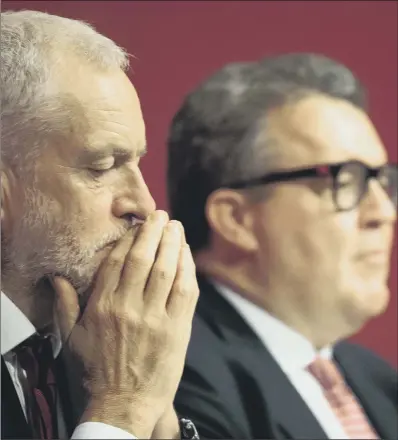  ?? PICTURES: PA WIRE. ?? UNDER PRESSURE: Jeremy Corbyn, seen with deputy leader Tom Watson, may have avoided conference clashes over Brexit.