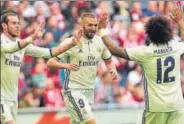  ?? AP PHOTO ?? Real Madrid's Karim Benzema (center) celebrates with Gareth Bale (left) and Marcelo after scoring on Saturday.