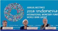  ?? Reuters ?? IMF first deputy managing director David Lipton, managing director Christine Lagarde and communicat­ions department director Gerry Rice at a news conference at the IMF and World Bank annual meetings Nusa Dua, Indonesia, on Thursday. —