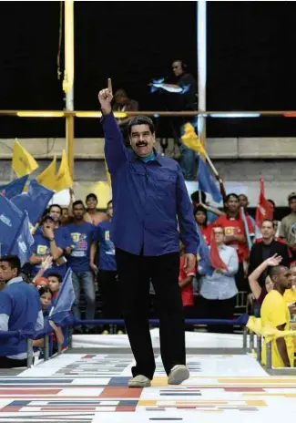  ?? Federico Parra - 7.fev.2018/AFP ?? O líder venezuelan­o, Nicolás Maduro, participa de evento de campanha em Caracas