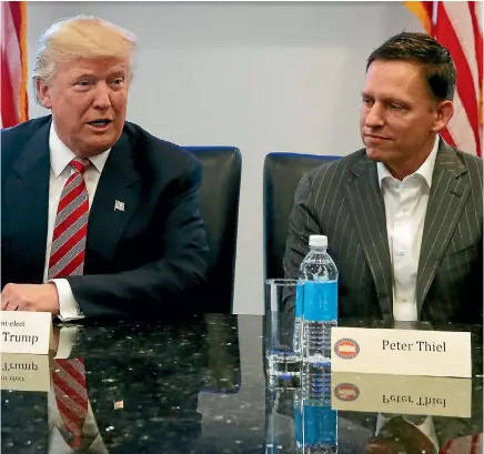  ?? PHOTO: REUTERS ?? Backers of Peter Thiel, above right, believe his business connection­s make him a valuable asset to New Zealand.