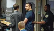  ?? DAMON HIGGINS / THE PALM BEACH POST ?? David Arthur Lerner, 36, makes his first appearance in a courtroom at the county jail Friday. Lerner is accused of cyberstalk­ing a Palm Beach County judge presiding over his case.
