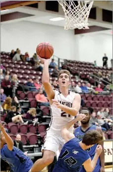  ?? Bud Sullins/Special to the Herald-Leader ?? Siloam Springs senior Noah Karp goes up for a shot against Rogers on Dec. 13. The Panthers play Prairie Grove at 8:30 p.m. Wednesday in the opening round of the Siloam Springs Holiday Classic.