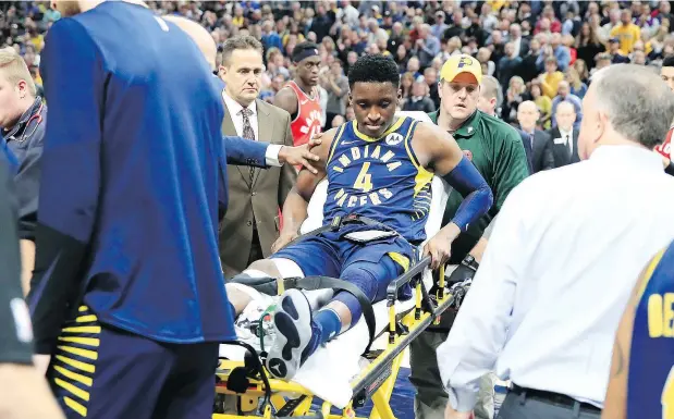 ?? — GETTY IMAGES ?? Indiana’s Victor Oladipo is taken off of the court on a stretcher Wednesday, after being injured in the second quarter.