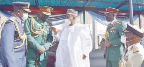  ??  ?? L-R: Oladayo Amao, chief of air staff; Ibrahim Attahiru, chief of army staff; Bashir Magashi, minister of defence; Lucky Irabor, chief of defence staff, and Awwal Gambo, chief of naval staff, during the pulling-out parade in honour of Gabriel Olonisakin, former chief of defence staff, in Abuja, yesterday. NAN