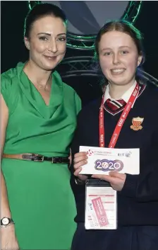  ??  ?? BT Young Scientist & Technology Exhibition 2020 Awards. Ruth Murphy, Legal Director, BT presents the Biological and Ecological Intermedia­te Individual third place award to Cliodhna Brady, Sacred Heart Secondary School, Louth