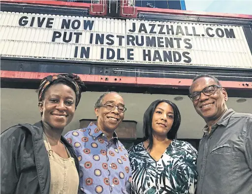  ?? ALVIN HALL ?? Among those who shared their stories for the “Driving the Green Book” podcast was artist and professor Tony Bingham, second from left, seen here at the Carver Theatre in Birmingham, Ala., alongside, left to right, podcast field producer Oluwakemi emi Aladesuyi, and hosts Janée Woods Weber and Alvin Hall.