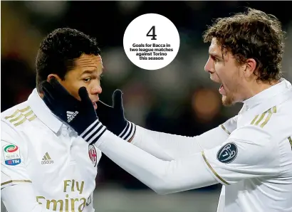  ?? AFP ?? 4 Goals for Bacca in two league matches against Torino this season AC Milan’s Carlos Bacca (left) celebrates with Manuel Locatelli after scoring against Torino. —