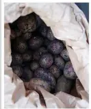 ??  ?? Potatoes are best stored in a paper sack in a cool, dark place