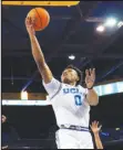  ?? Associated Press ?? UCLA guard Jaylen Clark (0) shoots against Norfolk State during the first half of an NCAA college basketball game on Monday in Los Angeles. Clark scored 19 points in the Bruins’ 86-56 victory.