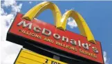  ?? AP PHOTO ?? Fast food giant McDonald’s says it will introduce several new safety standards once dine-in rooms reopen. to protect customers and workers from the spread of the virus.