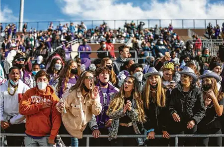  ?? Mark Mulligan / Staff photograph­er ?? Ridge Point students cheer during a game against North Shore High School in Galena Park. The positive test rate statewide hit a record Friday at 21.15 percent, according to a Houston Chronicle review — surpassing the previous high mark, 20.55 percent, in July.