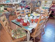  ??  ?? Judy O’Neal, owner of Tootie’s Treasures, says she keeps the most popular merchandis­e — items that are trending — front and center in her consignmen­t shop in Fort Oglethorpe.