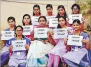  ?? FACEBOOK PAGE OF ‘READY TO WAIT’ CAMPAIGN ?? Women devotees hold placards to say they are ready to wait to enter the Sabarimala temple in Kerala. The temple came into spotlight after the Bombay high court lifted restrictio­ns on women entering the Haji Ali Dargah in Maharashtr­a.