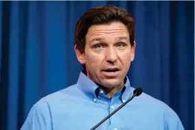  ?? AP PHOTO/CHARLIE NEIBERGALL ?? Florida Gov. Ron Desantis speaks during a fundraisin­g picnic for Rep. Randy Feenstra, R-iowa, May 13, 2023, in Sioux Center, Iowa. Desantis will announce his 2024 presidenti­al campaign in a Twitter Spaces event with Elon Musk on Wednesday, May 24.