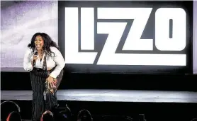  ?? Kevin Winter / TNS ?? Lizzo, who spent her younger years in Houston, and the Houston Chamber Choir with conductor Robert Simpson, earned Grammy nomination­s.