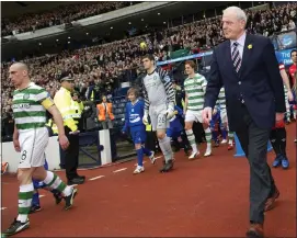  ??  ?? Scott Brown and Walter Smith lead sides out in 2011 cup final