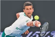  ?? AP FILE PHOTO/ANDY BROWNBILL ?? Novak Djokovic will be playing for his ninth Australian Open title and his 18th Grand Slam championsh­ip overall on Sunday at Melbourne Park.