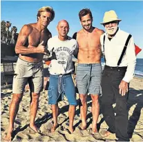  ??  ?? Beach boys: Danny Cipriani with Laird Hamilton (left), singer-songwriter Kenny Chesney (second left) and friend