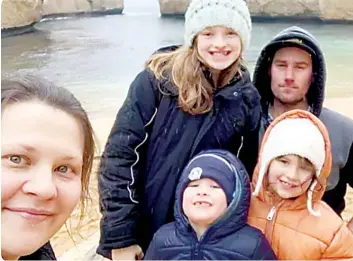  ?? ?? Emma Trenarry of Darnum, photograph­ed with her husband Warren, and children Charli, Tahilia and Lachy, is battling cancer with support of her three young children, family and community.