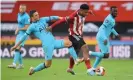  ?? Photograph: Michael Regan/Reuters ?? Giovani Lo Celso (left) challenges Sheffield United’s Lys Mousset during Tottenham’s recent 3-1 defeat at Bramall Lane.