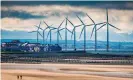  ??  ?? Teesside Wind Farm, also known as Redcar Wind Farm, towers over the town of Redcar. Photograph: Bill Allsopp/Alamy