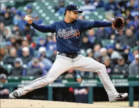  ?? PHOTOS BY JONATHAN DANIEL / GETTY IMAGES ?? Braves starter Anibal Sanchez (1-0) pitched six scoreless innings and allowed three hits, with one walk and six strikeouts.