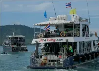  ?? AFP ?? Two boats carrying divers leave Chalong pier in Phuket on Saturday as rescue operations continue for missing tourists. —