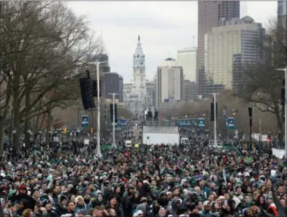  ??  ?? Fans line the Benjamin Franklin Parkway in Philadelph­ia for the Eagles Super Bowl victory parade Thursday. The Birds beat the New England Patriots 41-33 in Super Bowl 52, and more than 2 million people gathered in the city to celebrate.