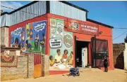  ?? /Supplied ?? Follow the money: Tiger Brands has had advertisin­g painted on a spaza store to drive demand for its products.