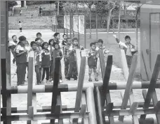  ?? HOU LIQIANG / CHINA DAILY ?? Barricades outside Naji Primary School in Pu’er, Yunnan province, protect pupils from possible elephant intruders.