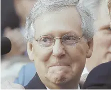  ?? AP PHOTO ?? ‘ESSENTIALL­Y REPEALED’: Senate Majority Leader Mitch McConnell grins during the GOP’s celebratio­n.