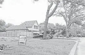  ?? Nancy Sarnoff / Houston Chronicle ?? Despite job losses related to cutbacks in the energy industry, Houston-area single-family home sales are off just 1 percent year-to-date.