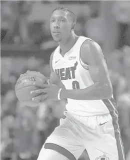  ?? CHRISTIAN PALMA/AP ?? Miami Heat’s Josh Richardson drives with the ball during the first quarter against the Brooklyn Nets on Saturday in Mexico City.