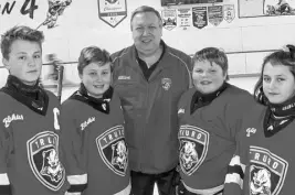  ?? CONTRIBUTE­D ?? The Truro Peewee C Red house league team, from left, Tom Frizzell, Camden Porter, coach Greg Porter, Bobby Cameron and Mataya Toney.